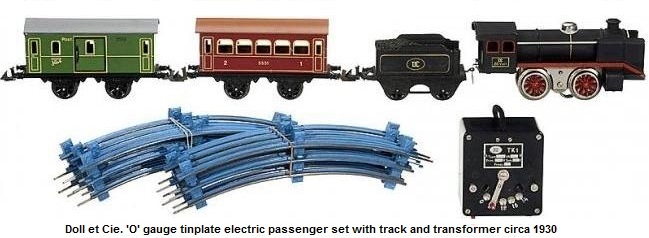 Doll et Cie. 'O' gauge electric passenger set with steam loco, tender, baggage car, pullman, track and transformer circa 1930