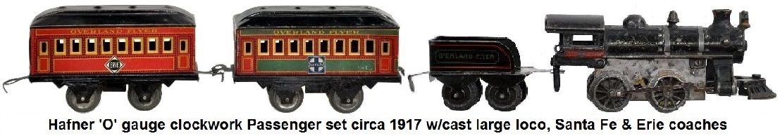 Hafnerclockwork passenger set Circa 1917 w Large cast loco, red & green striped tender, SF coach & Erie coach in 'O' gauge