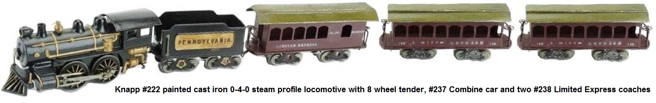 Knapp #222 painted cast iron 0-4-0 steam profile electric loco with 8 wheel Pennsylvania tender, #237 combine 
	car and two #238 Limited Express Pullman passenger coaches in 2-inch gauge
