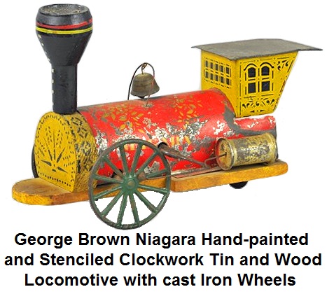 George W. Brown Niagara hand painted and stenciled clockwork tin and wood locomotive with cast iron wheels, 10 inches long, circa 1860