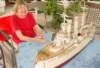bettykimballandoneofwardsprizedgermanbattleshipmodels_small.jpg